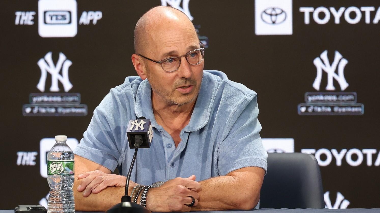 Aug 23, 2023; Bronx, New York, USA; New York Yankees general manager Brian Cashman talks with the media before the game between the Yankees and the Washington Nationals at Yankee Stadium. / Vincent Carchietta-USA TODAY Sports