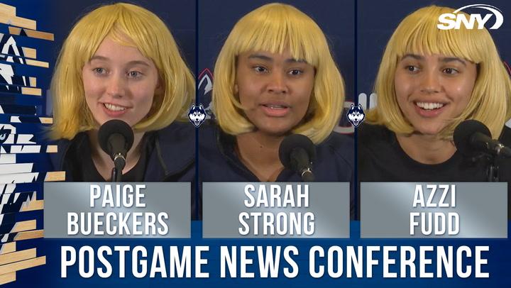 Paige Bueckers, Azzi Fudd, and Sarah Strong wear CD-inspired wigs at UConn's press event.