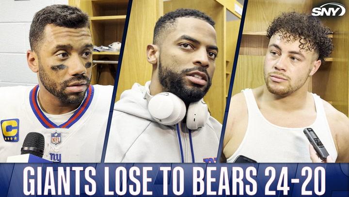 Giants players react after losing to Bears 24-20.