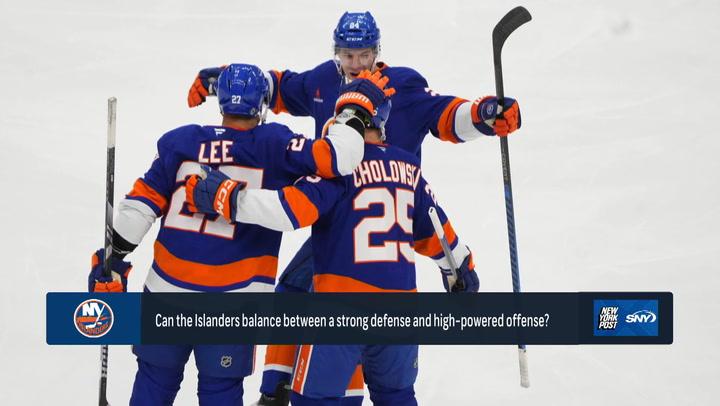 Islanders players celebrate a goal, searching for more offense in the 2024 season.