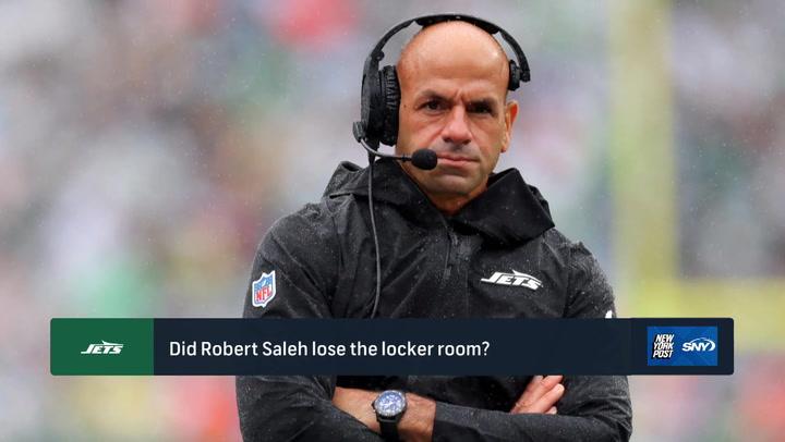 Jets coach Robert Saleh in headset; discussion on Aaron Rodgers' reaction to his firing.