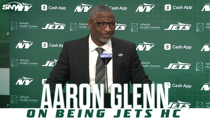 Aaron Glenn discusses his new role as Jets head coach, addressing players and Aaron Rodgers.