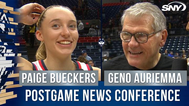 Paige Bueckers and Geno Auriemma react after Bueckers scores her 2,000th UConn point.