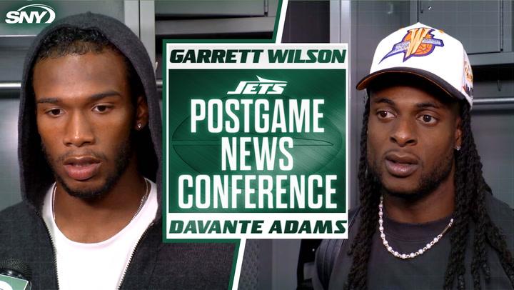 Jets' Garrett Wilson and Davante Adams at postgame conference after 31-6 loss to Cardinals.