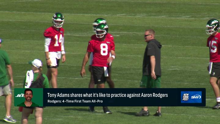 Jets players on practice field