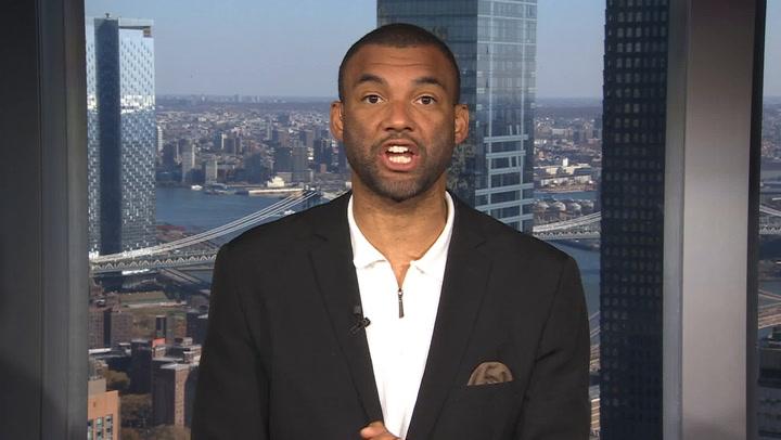 A man in a suit discusses the Giants benching Daniel Jones for Tommy DeVito's debut.