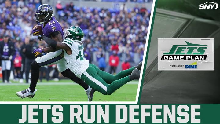 Ravens' Edwards is tackled by Jets' Sherwood during a game, with the text "Jets Game Plan presented by D