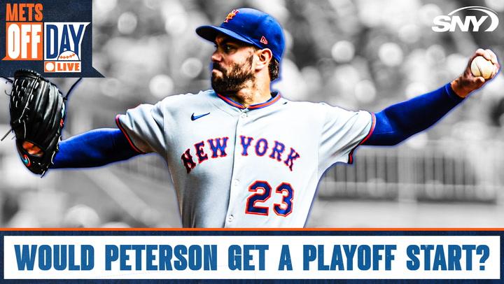 Pitcher in Mets uniform throws.