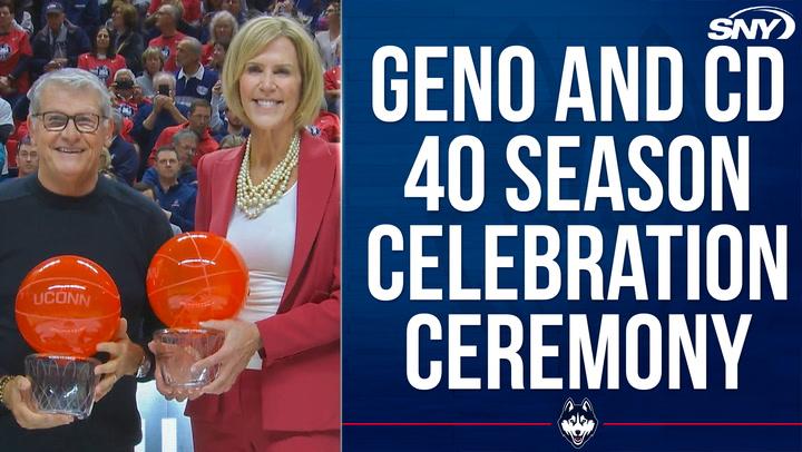 Geno Auriemma and Chris Dailey celebrate 40 seasons at UConn during a ceremony.