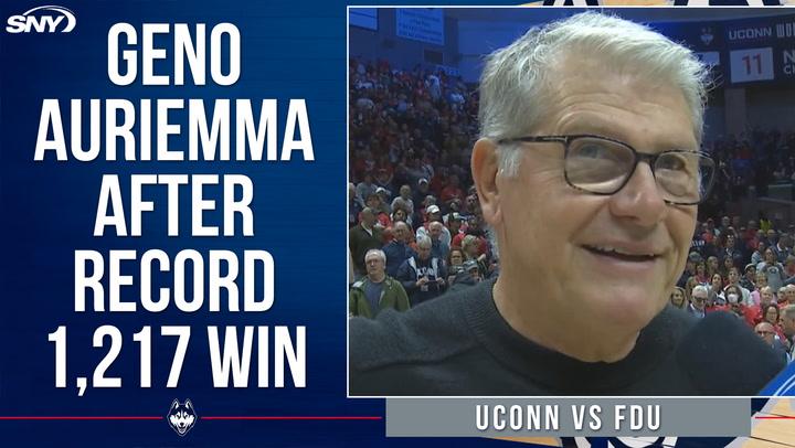 Geno Auriemma celebrates after UConn's 1,217th win, breaking the NCAA all-time record.