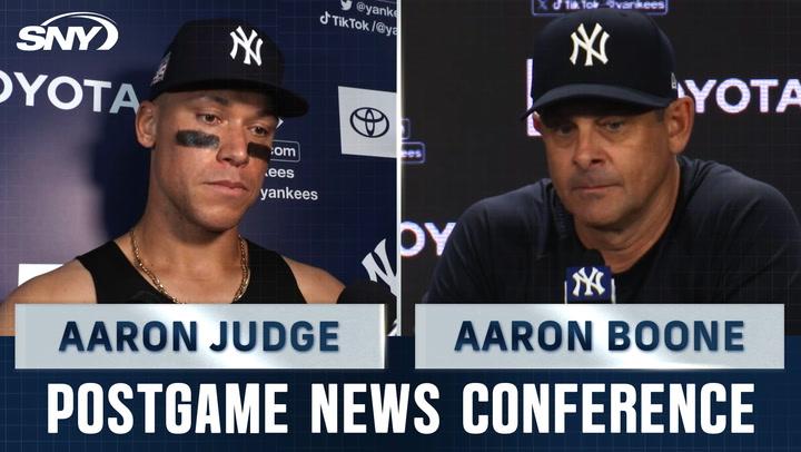 Two Yankees addressing media.