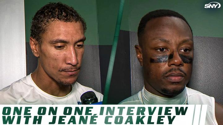 One on one interview with Jeane Coakley featuring two football players, SNY network logo in the corner.