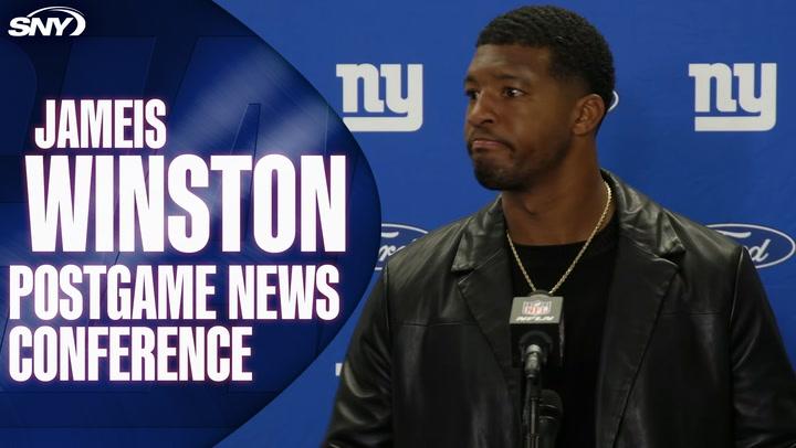 Jameis Winston postgame news conference with Giants logos in the background.