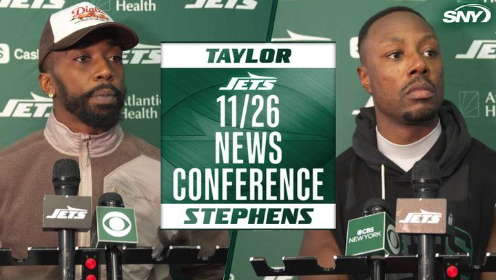 Jets' Taylor and Stephens at 11/26 news conference with team and network microphones.