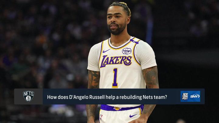 D’Angelo Russell in Lakers jersey after Nets trade, pondering his impact on the rebuilding team.