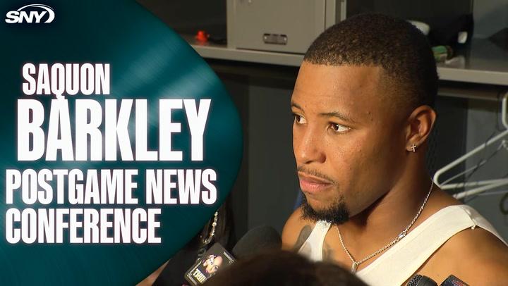 Saquon Barkley answers questions at a postgame news conference.