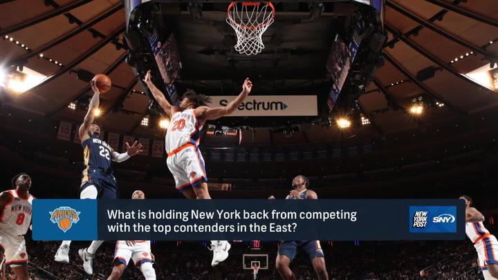 A Knicks player leaps defensively, highlighting early contributors in 2024 NBA season analysis.