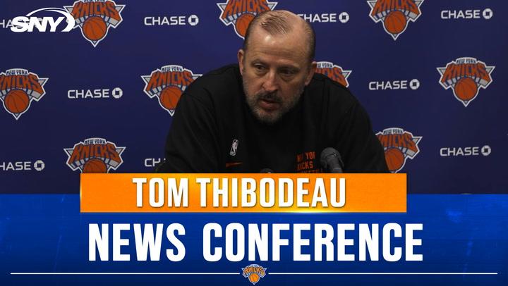 Coach at a press conference with New York Knicks backdrop, referencing 021025THIBS.2.