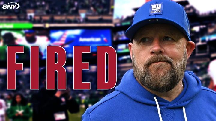 New York Giants coach next to large text reading "FIRED" with a stadium background.