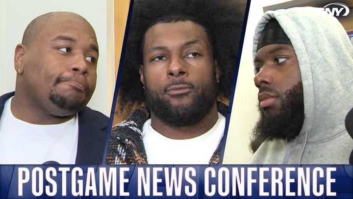 Three New York Jets players at a postgame news conference.