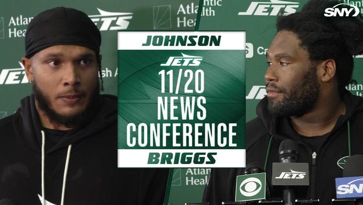 Jets news conference on 11/20 featuring Johnson and Briggs with SNY and CBS microphones visible.