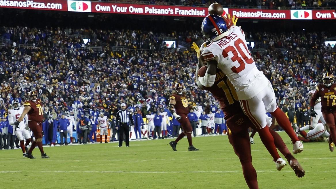 Dec 18, 2022; Landover, Maryland, USA; New York Giants cornerback Darnay Holmes (30) breaks up a pass intended for Washington Commanders wide receiver Curtis Samuel (10) in the end zone on fourth and goal in the final minute of the fourth quarter at FedExField.