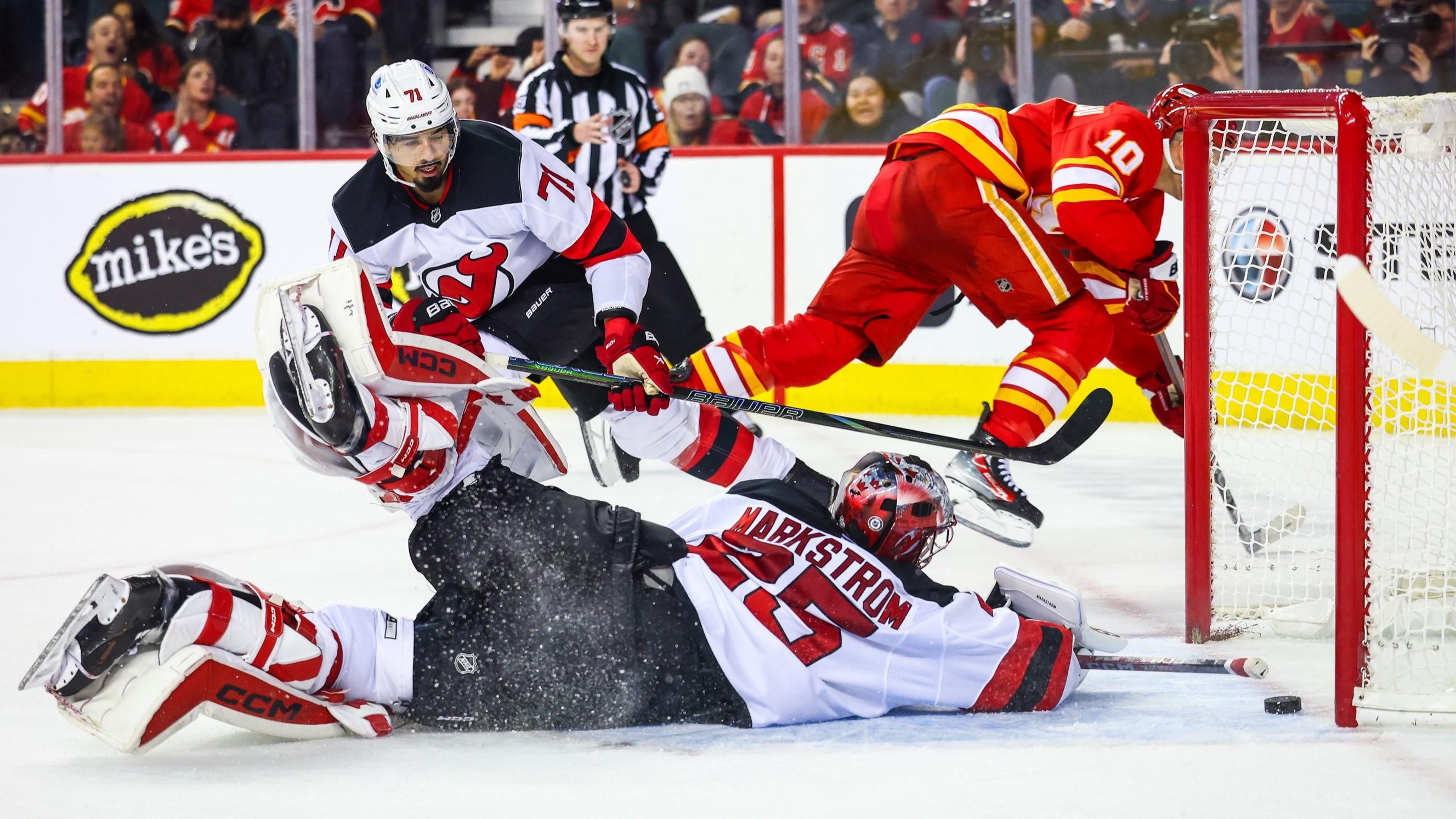 Devils can't withstand Flames' offensive in 3-0 loss to snap winning streak