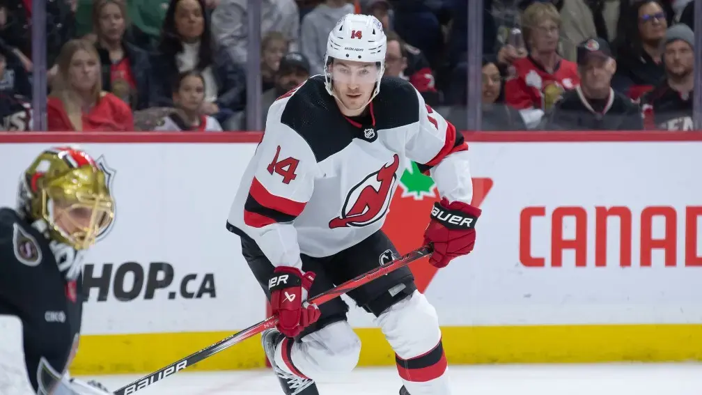 New Jersey Devils right wing Nathan Bastian (14) follows the puck on a rebound from Ottawa Senatorsgoalie Joonas Korpisalo (70) in the second period at the Canadian Tire Centre. / Marc DesRosiers-USA TODAY Sports