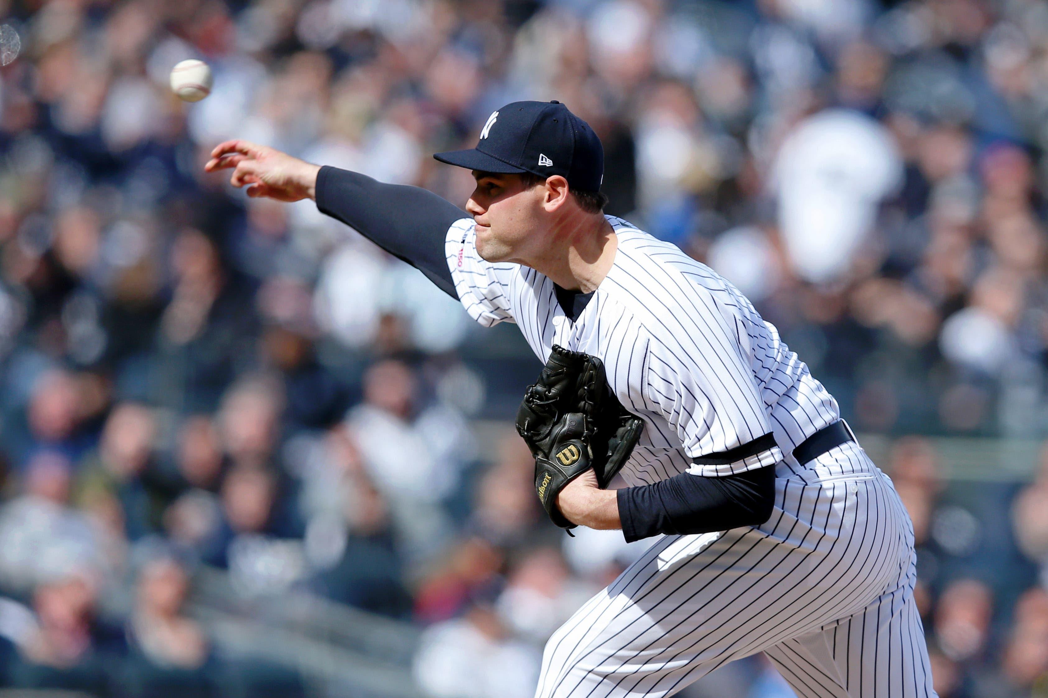 Mar 28, 2019; Bronx, NY, USA; New York Yankees relief pitcher Adam Ottavino (0) pitches against the Baltimore Orioles during the sixth inning at Yankee Stadium. Mandatory Credit: Brad Penner-USA TODAY Sports / Brad Penner