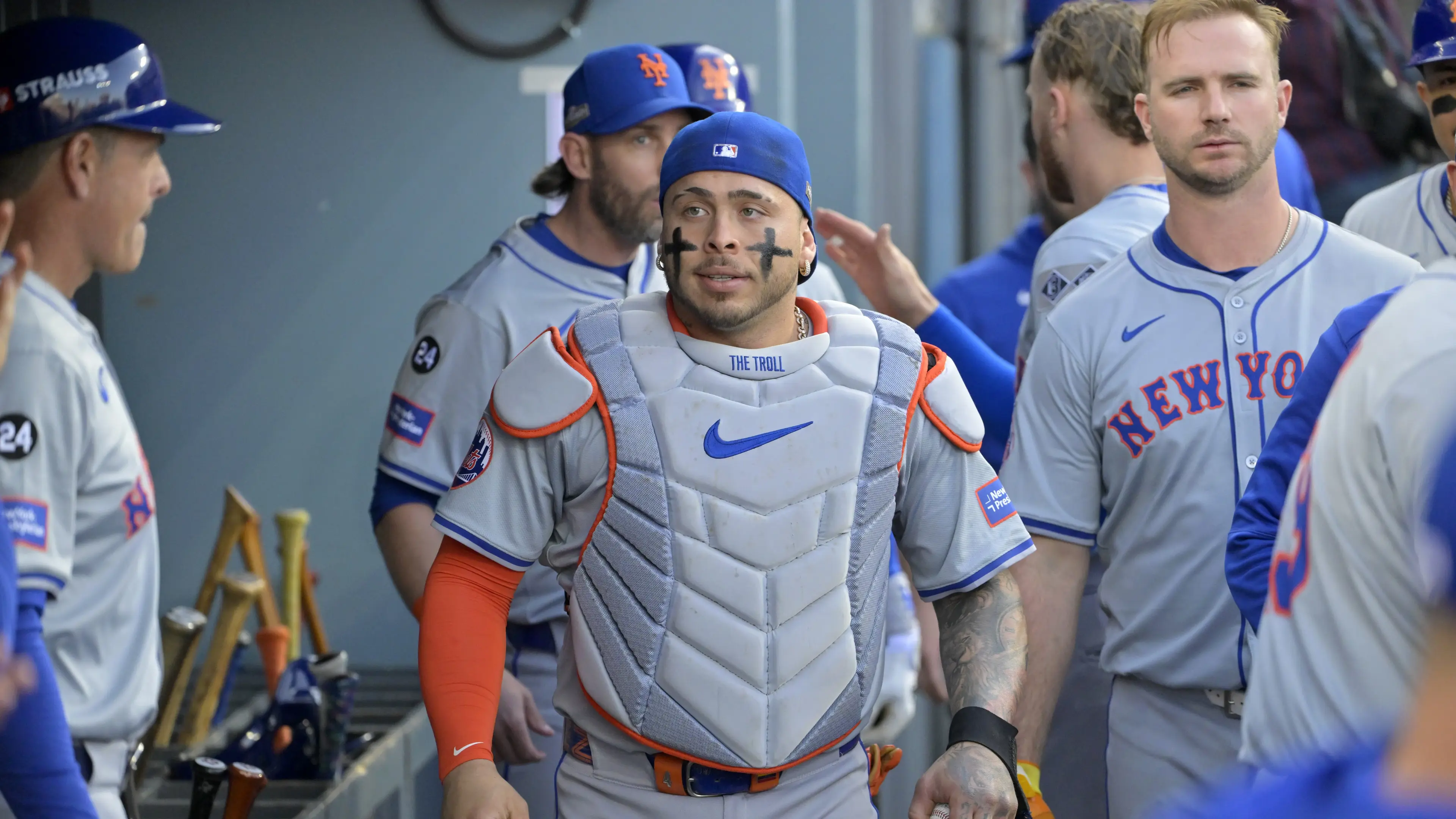 Oct 20, 2024; Los Angeles, California, USA; New York Mets catcher Francisco Alvarez (4) looks on in the dugout before game six against the Los Angeles Dodgers in the NLCS for the 2024 MLB playoffs at Dodger Stadium. Mandatory Credit: Jayne Kamin-Oncea-Imagn Images / © Jayne Kamin-Oncea-Imagn Images