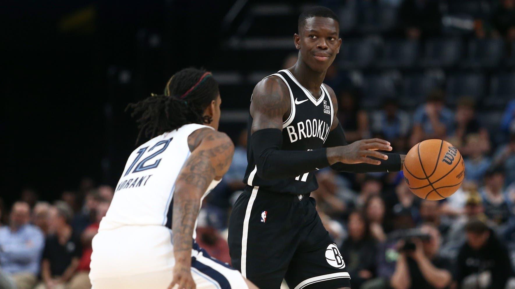 Oct 30, 2024; Memphis, Tennessee, USA; Brooklyn Nets guard Dennis Schroder (17) dribbles as Memphis Grizzlies guard Ja Morant (12) defends during the first half at FedExForum. / Petre Thomas-Imagn Images