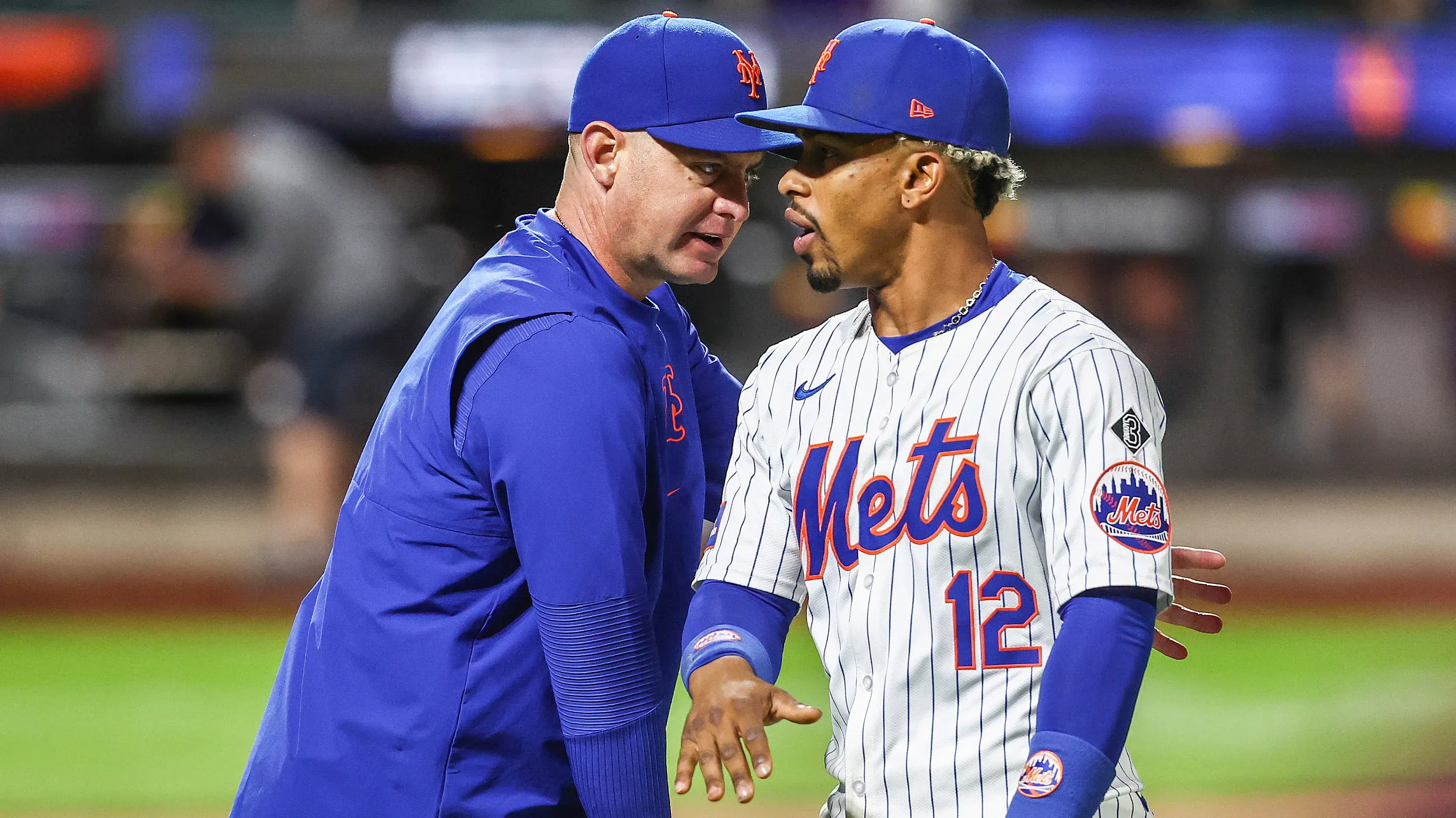 May 30, 2024; New York City, New York, USA; New York Mets manager Carlos Mendoza (64) congratulates shortstop Francisco Lindor (12) after defeating the Arizona Diamondbacks 3-2 at Citi Field. / Wendell Cruz - USA TODAY Sports