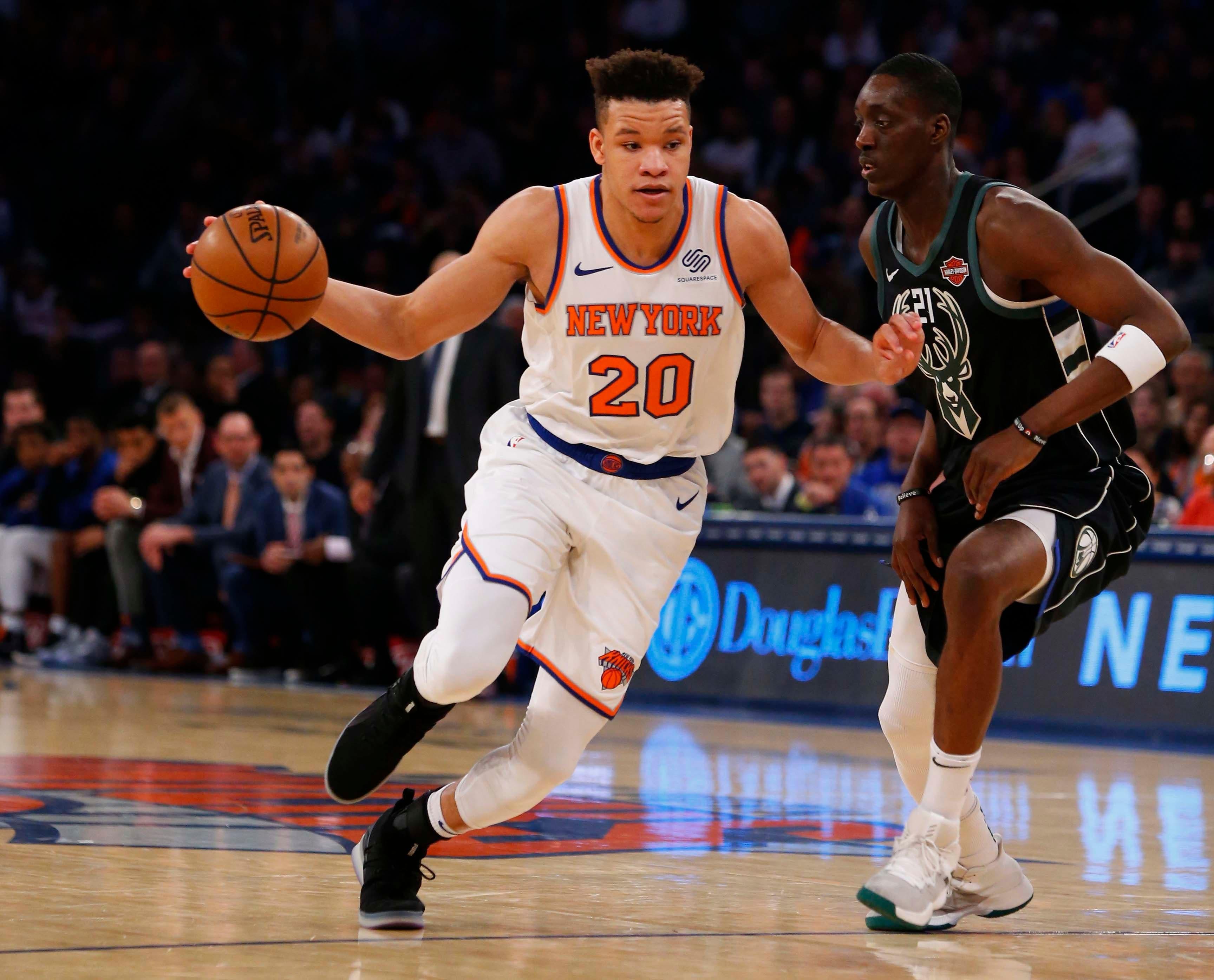 Dec 1, 2018; New York, NY, USA; New York Knicks forward Kevin Knox (20) drives to the basket against the Milwaukee Bucks guard Tony Snell (21) during first half at Madison Square Garden. Mandatory Credit: Noah K. Murray-USA TODAY Sports / Noah K. Murray