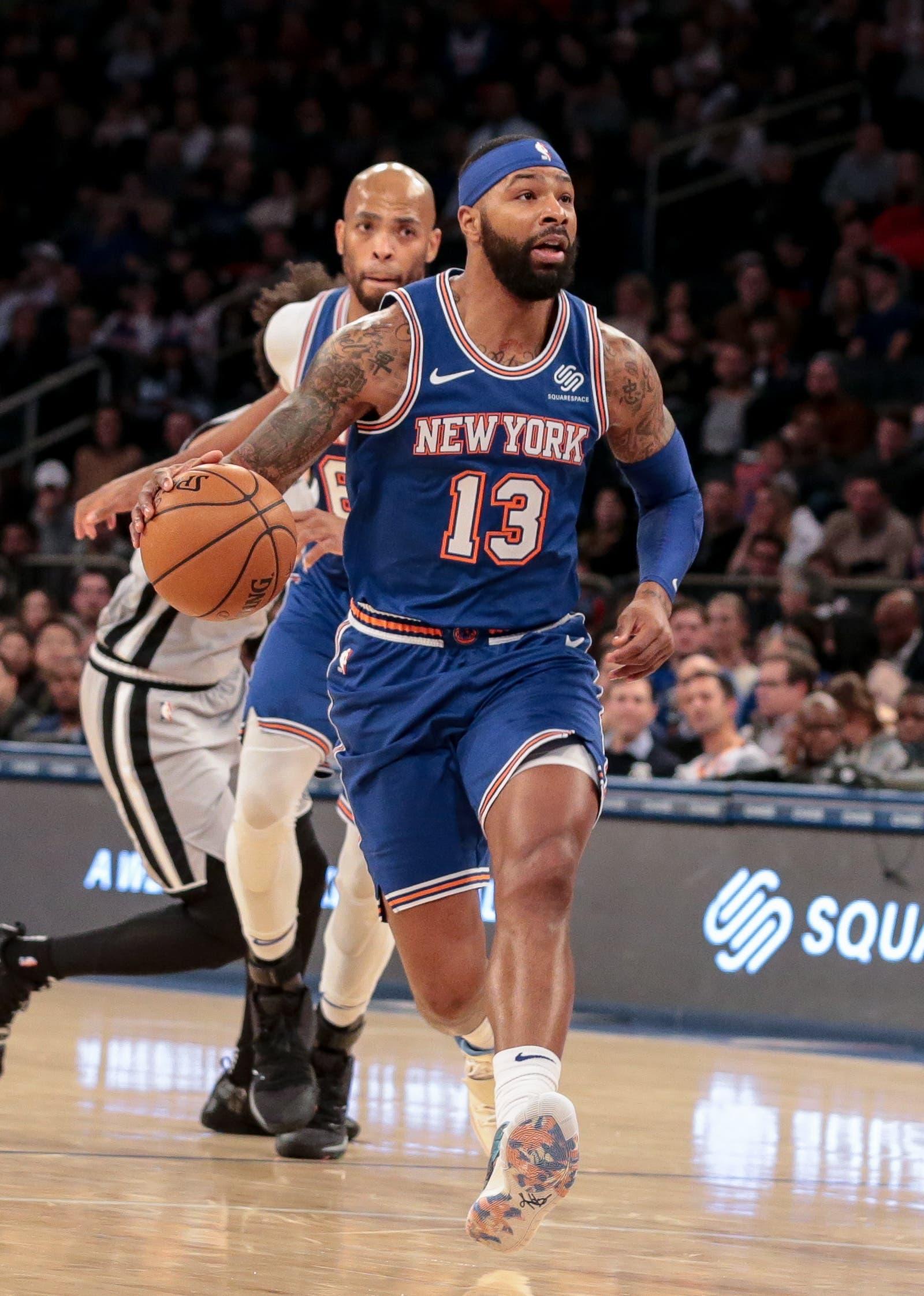 Nov 23, 2019; New York, NY, USA; New York Knicks forward Marcus Morris Sr. (13) shoots the ball during the first quarter against the San Antonio Spurs at Madison Square Garden. Mandatory Credit: Vincent Carchietta-USA TODAY Sports / Vincent Carchietta