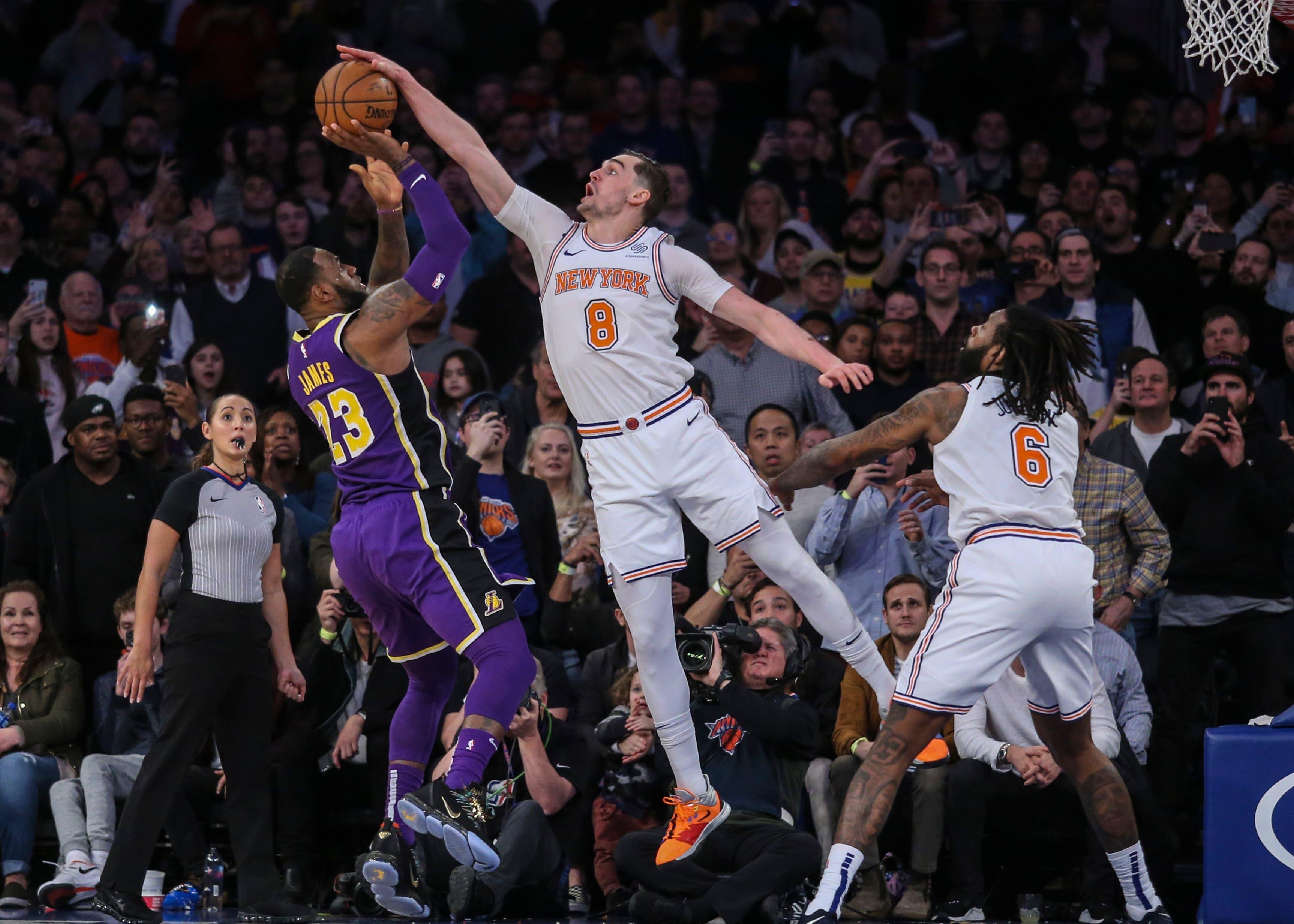 Mar 17, 2019; New York, NY, USA; New York Knicks forward Mario Hezonja (8) blocks Los Angeles Lakers forward LeBron James (23) shot at the buzzer in the Knicks 124-123 victory at Madison Square Garden. Mandatory Credit: Wendell Cruz-USA TODAY Sports / Wendell Cruz