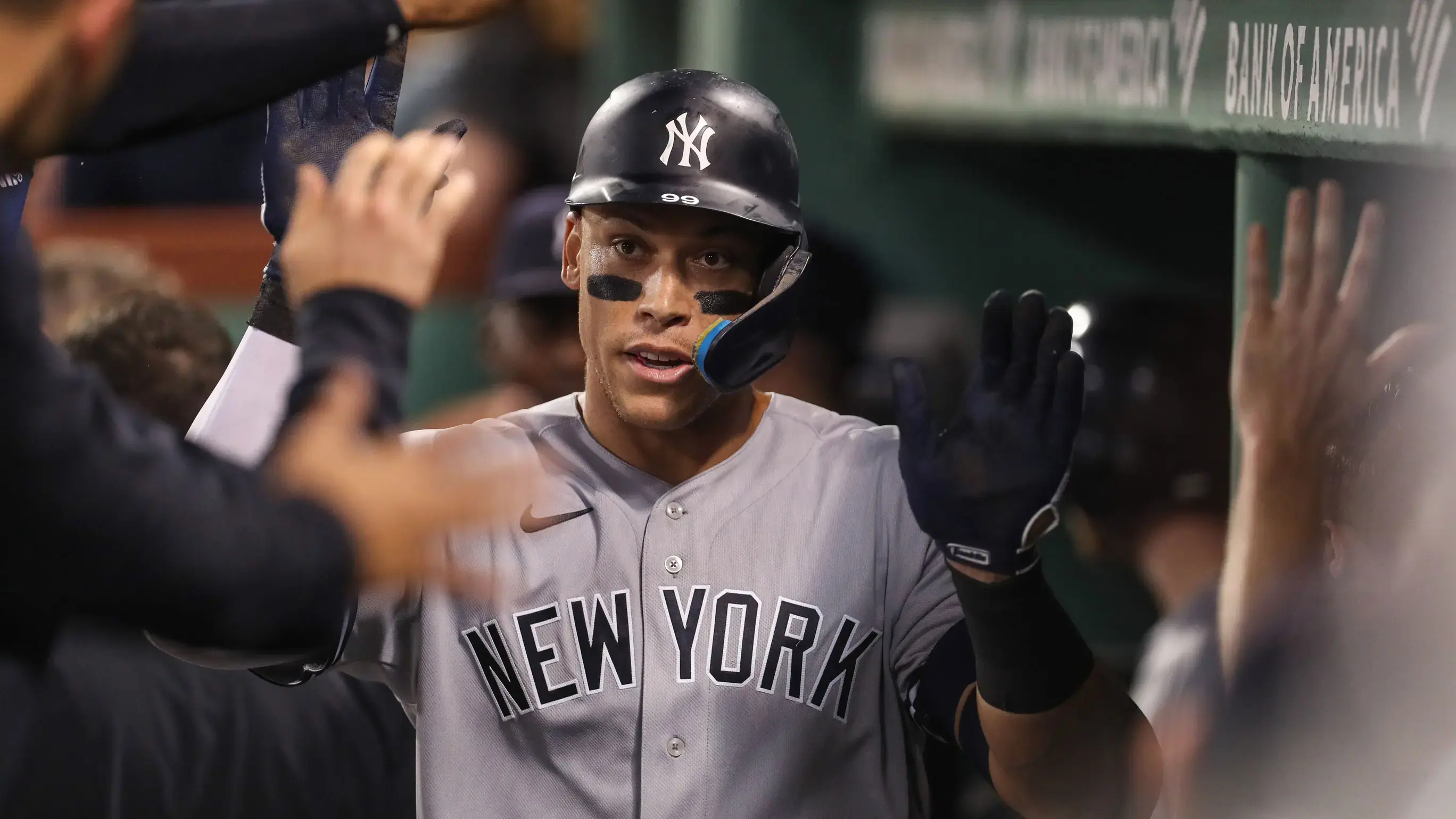 Sep 13, 2022; Boston, Massachusetts, USA; New York Yankees center fielder Aaron Judge (99) celebrates with teammates after hitting a home run during the sixth inning against the Boston Red Sox at Fenway Park. / Paul Rutherford-USA TODAY Sports