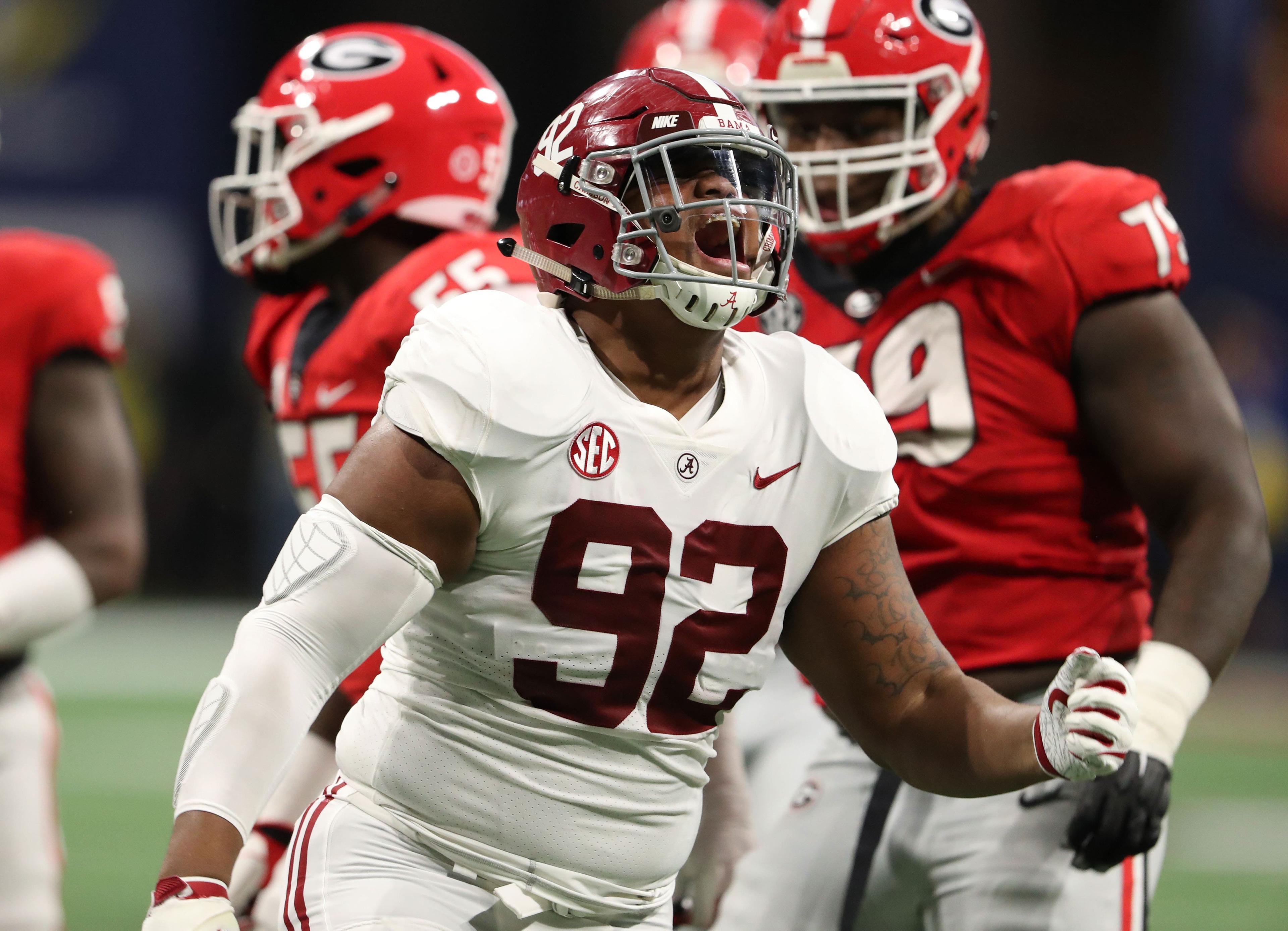 Dec 1, 2018; Atlanta, GA, USA; Alabama Crimson Tide defensive lineman Quinnen Williams (92) reacts after a sack against the Georgia Bulldogs during the first quarter in the SEC championship game at Mercedes-Benz Stadium. Mandatory Credit: Jason Getz-USA TODAY Sports / Jason Getz