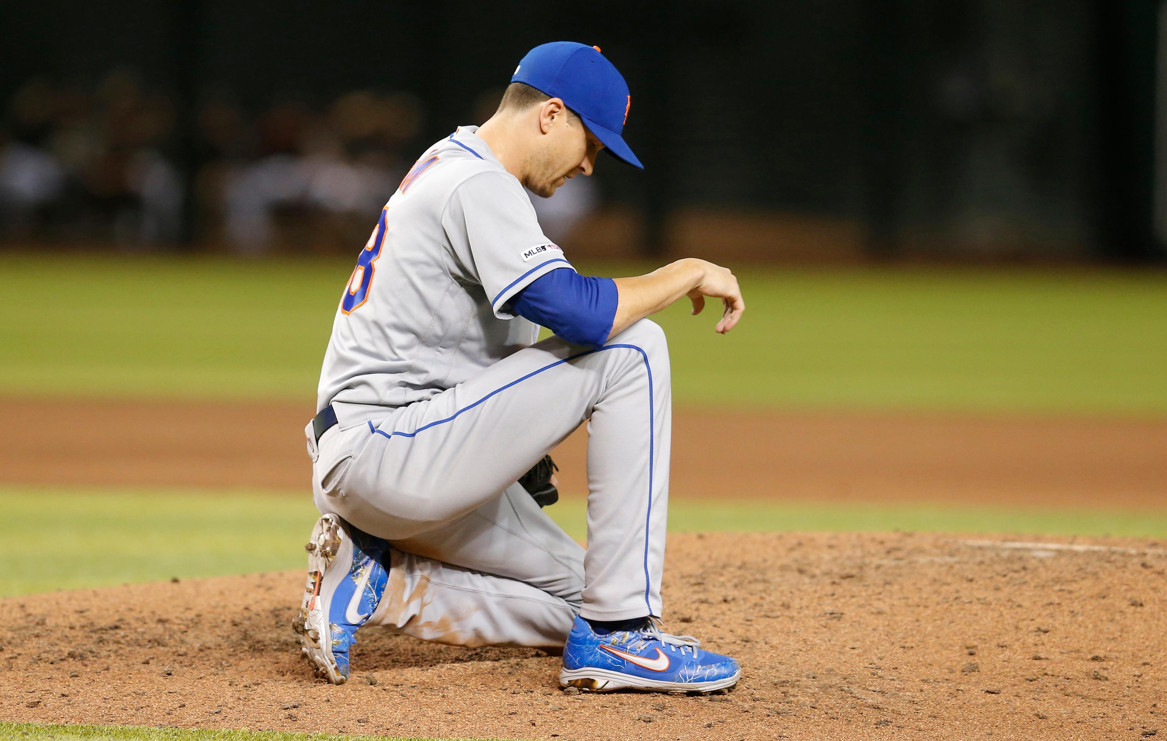 Jun 1, 2019; Phoenix, AZ, USA; New York Mets starting pitcher Jacob deGrom (48) reacts after throwing a pitch against the Arizona Diamondbacks in the seventh inning during a baseball game at Chase Field. Mandatory Credit: Rick Scuteri-USA TODAY Sports