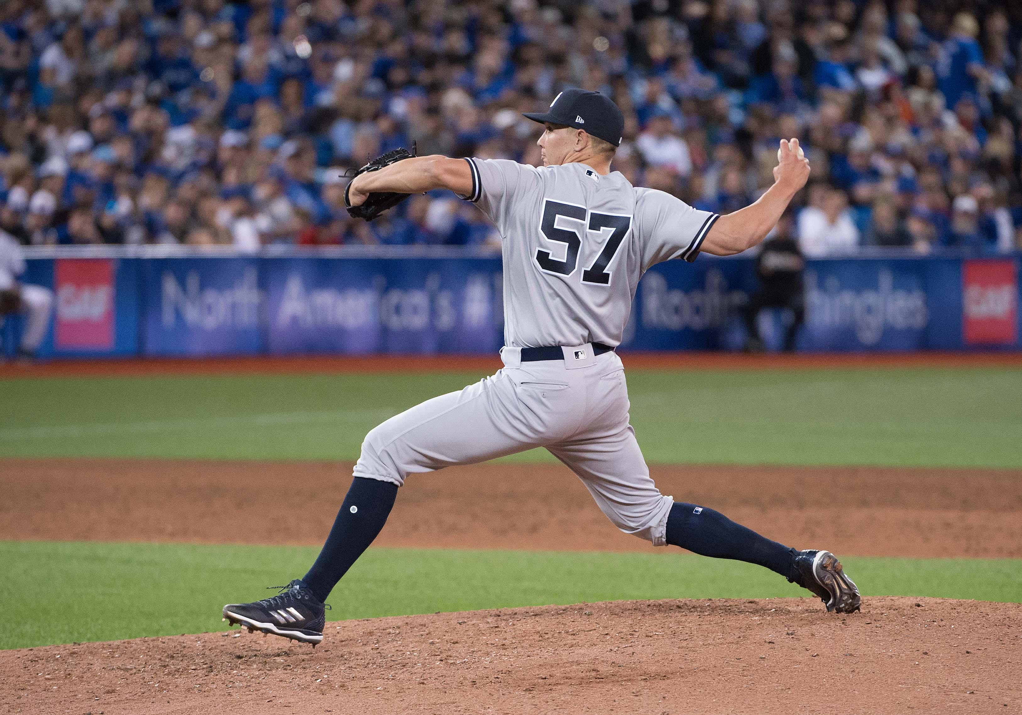 New York Yankees relief pitcher Chad Green throws pitch in the sixth inning during the Toronto Blue Jays season home opener at Rogers Centre. / Nick Turchiaro/USA TODAY Sports