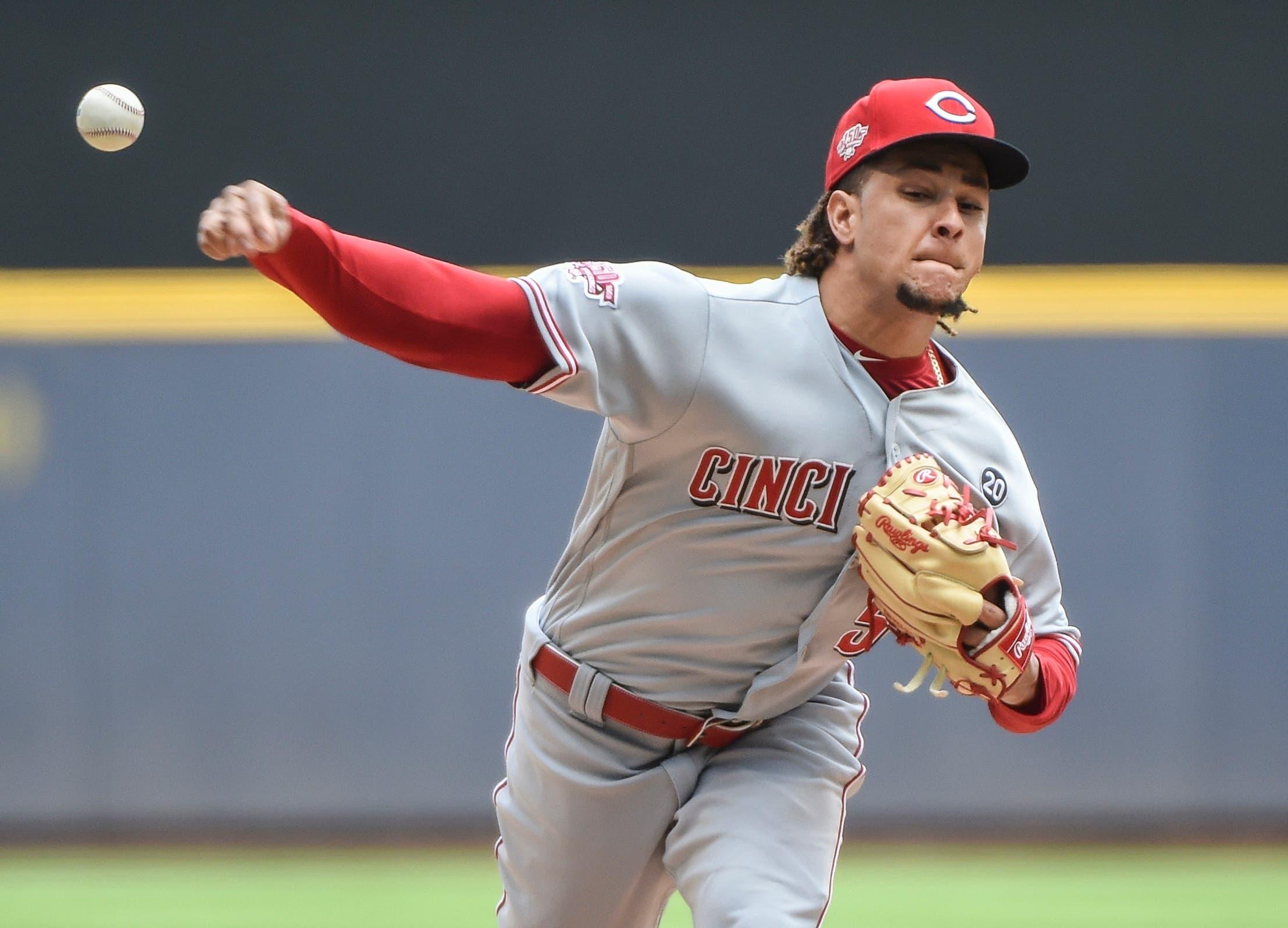 Jun 22, 2019; Milwaukee, WI, USA; Cincinnati Reds pitcher Luis Castillo (58) throws a pitch in the first inning against the Milwaukee Brewers at Miller Park. Mandatory Credit: Benny Sieu-USA TODAY Sports / Benny Sieu