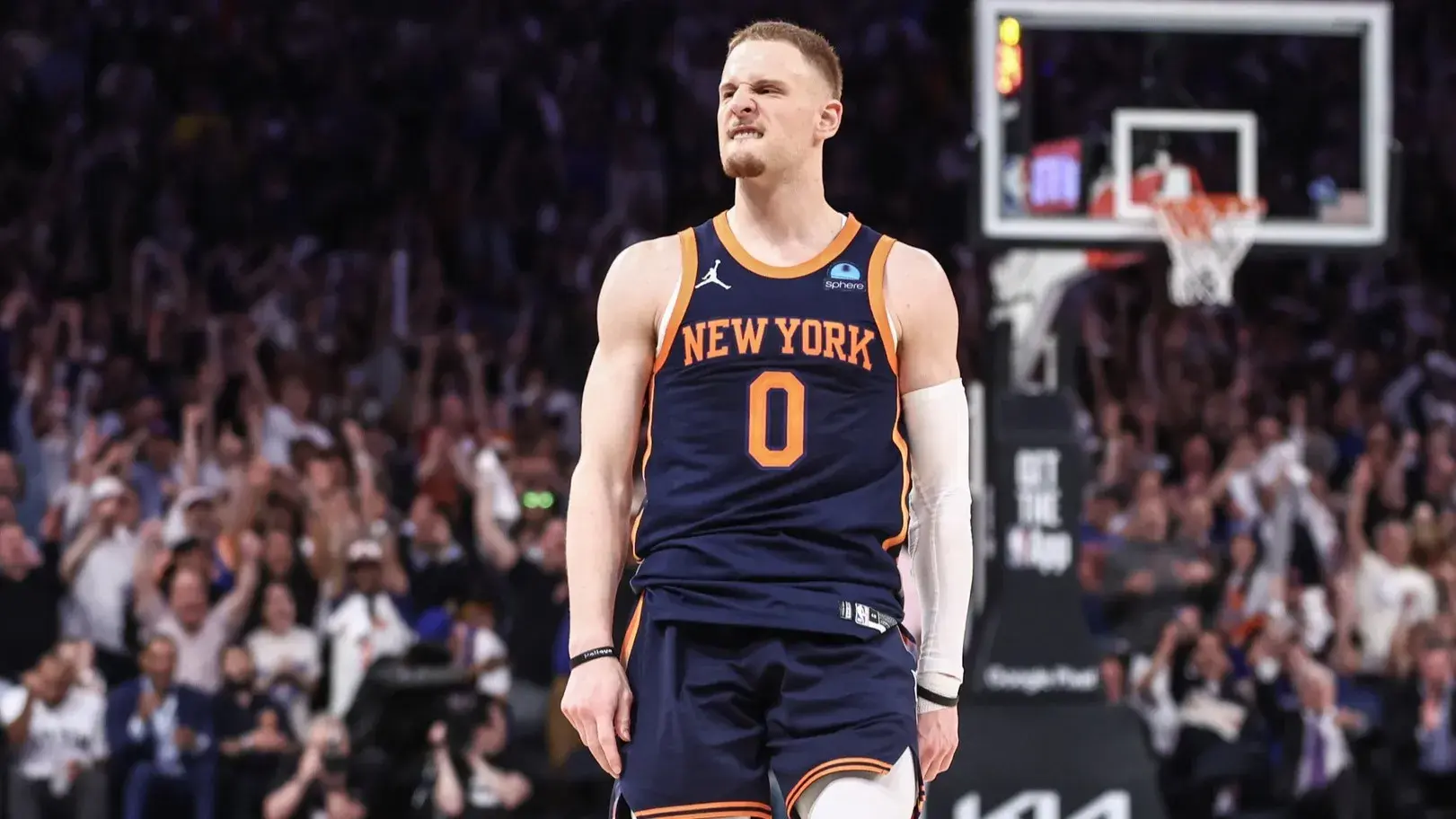 May 8, 2024; New York, New York, USA; New York Knicks guard Donte DiVincenzo (0) celebrates after making a three point shot in the fourth quarter against the Indiana Pacers during game two of the second round for the 2024 NBA playoffs at Madison Square Garden. / Wendell Cruz-USA TODAY Sports