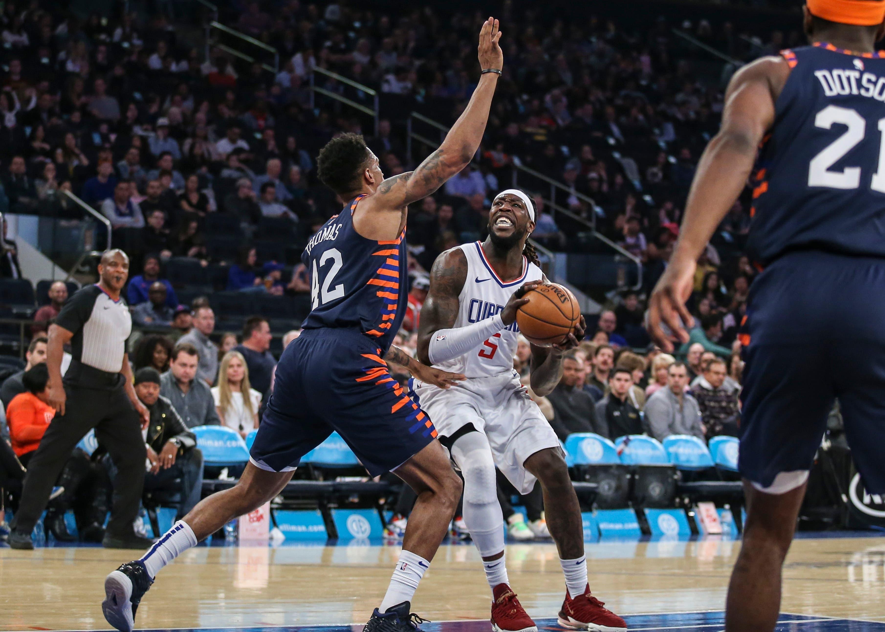 Mar 24, 2019; New York, NY, USA; Los Angeles Clippers forward Montrezl Harrell (5) drives to the basket in the first quarter against New York Knicks forward Lance Thomas (42) at Madison Square Garden. Mandatory Credit: Wendell Cruz-USA TODAY Sports / Wendell Cruz