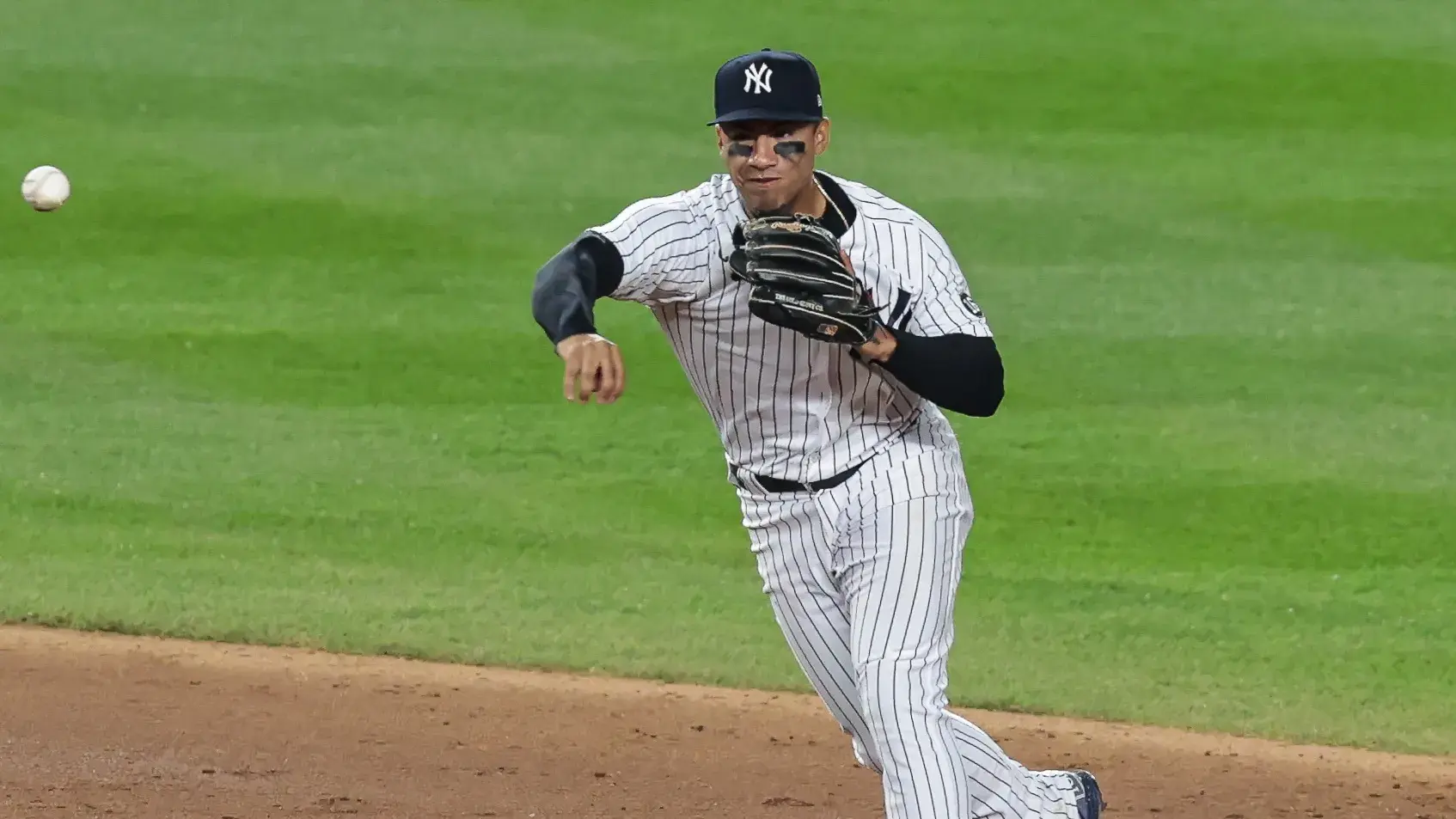 Apr 7, 2021; Bronx, New York, USA; New York Yankees shortstop Gleyber Torres (25) commits a throwing error in the top of the tenth inning against the Baltimore Orioles at Yankee Stadium. Mandatory Credit: Vincent Carchietta-USA TODAY Sports / © Vincent Carchietta-USA TODAY Sports