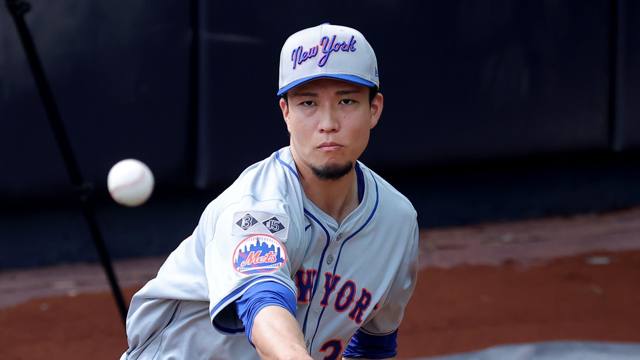 Jul 23, 2024; Bronx, New York, USA; New York Mets injured starting pitcher Kodai Senga (34) works out in the bullpen at Yankee Stadium before a game against the New York Yankees. Mandatory Credit: Brad Penner-Imagn Images