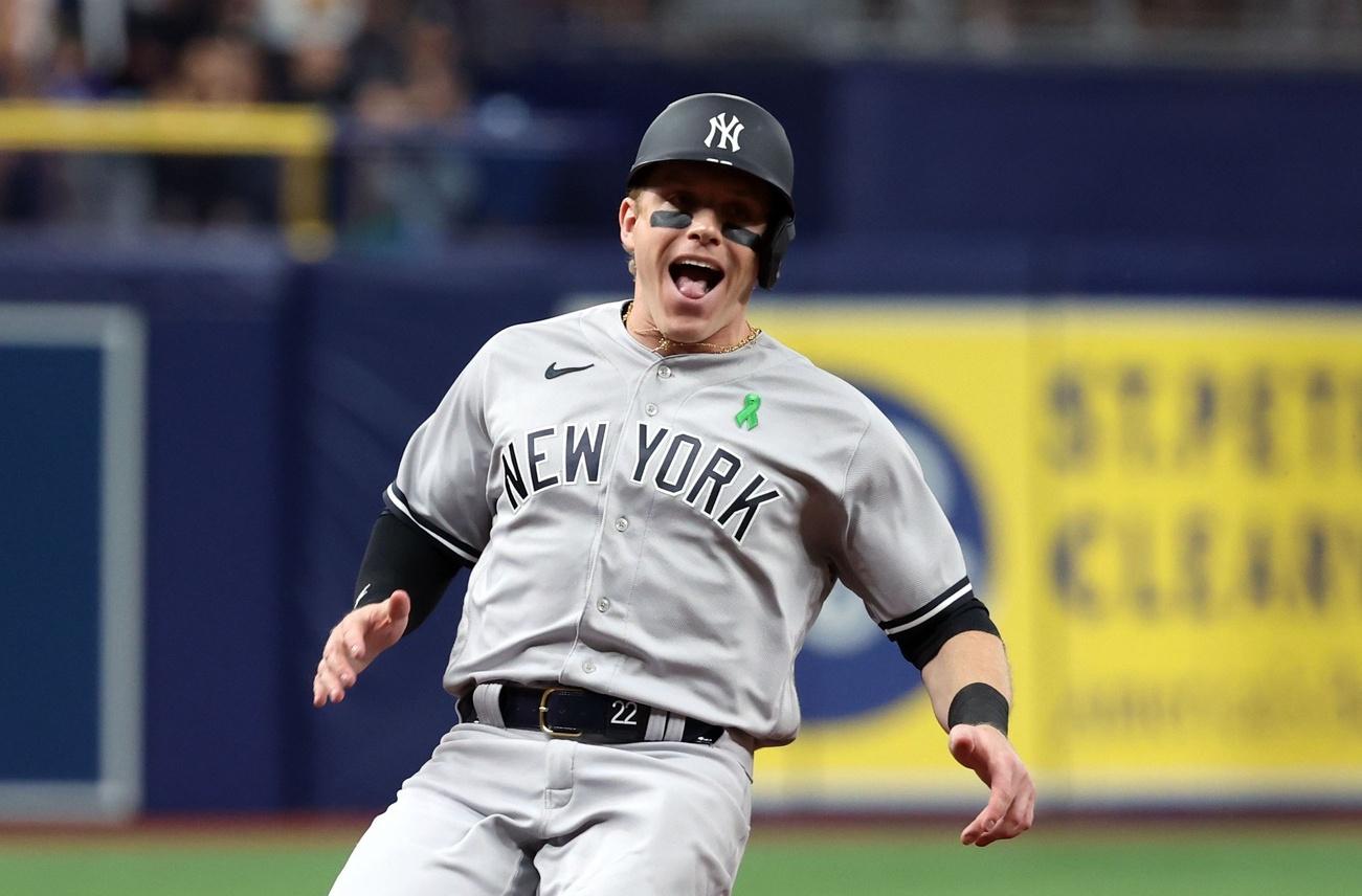 New York Yankees center fielder Harrison Bader (22) celebrates as he runs to third base against the Tampa Bay Rays during the eighth inning at Tropicana Field. / Kim Klement-USA TODAY Sports