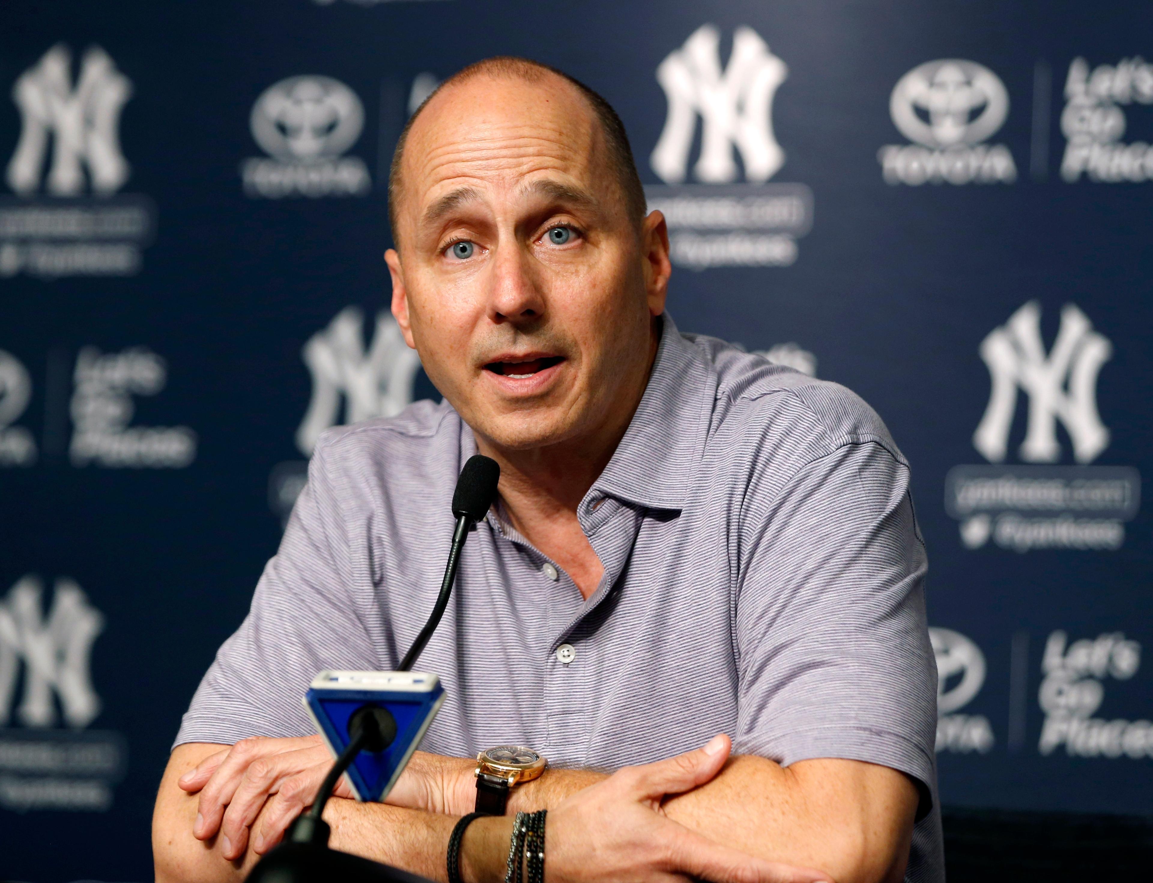 New York Yankees general manager Brian Cashman speaks to reporters during a press conference in which he addressed the Yankees trades and acquisitionsat Yankee Stadium in New York, Monday, July 31, 2017. (AP Photo/Kathy Willens)