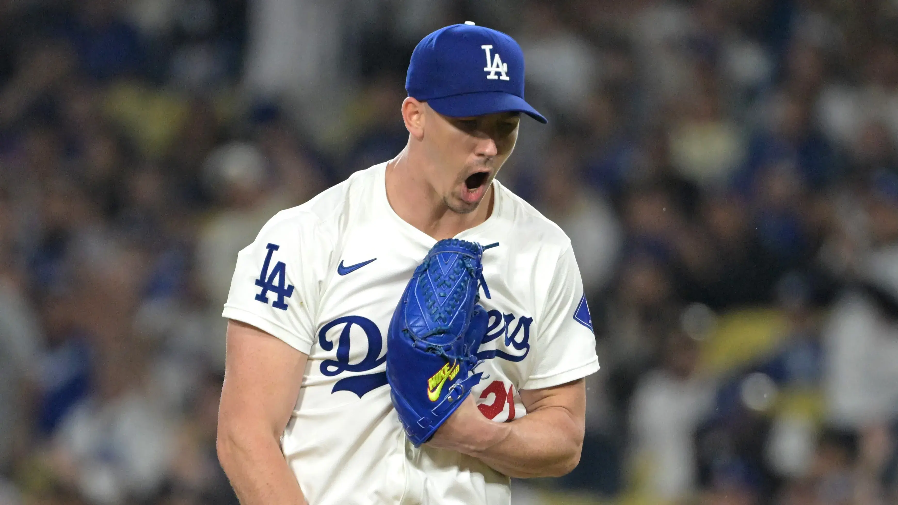 Los Angeles Dodgers starting pitcher Walker Buehler (21) reacts after a double play to end the fourth inning against the San Diego Padres at Dodger Stadium. / Jayne Kamin-Oncea - Imagn Images