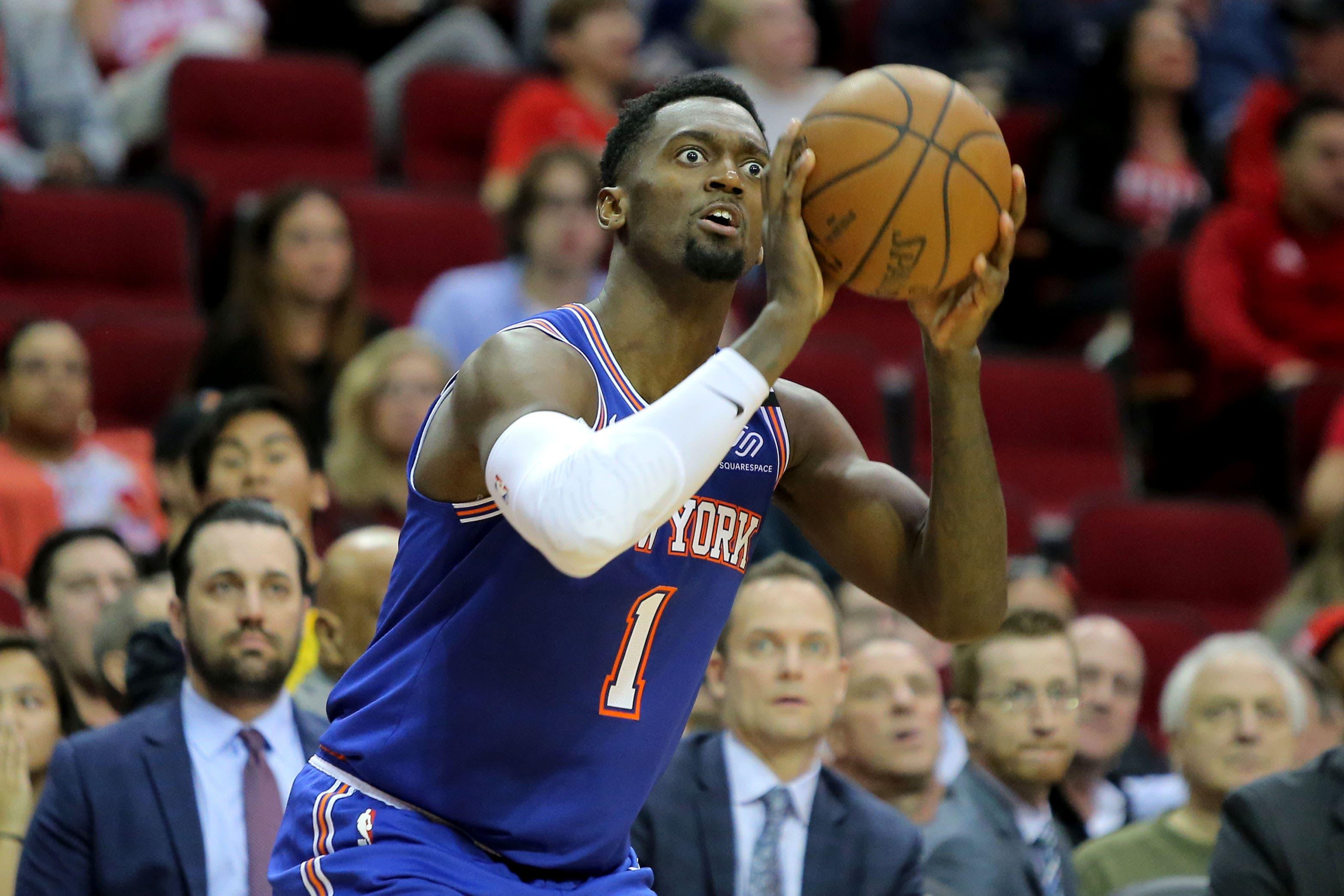 Feb 24, 2020; Houston, Texas, USA; New York Knicks forward Bobby Portis (1) takes a three-point shot against the Houston Rockets during the third quarter at Toyota Center. Mandatory Credit: Erik Williams-USA TODAY Sports / Erik Williams