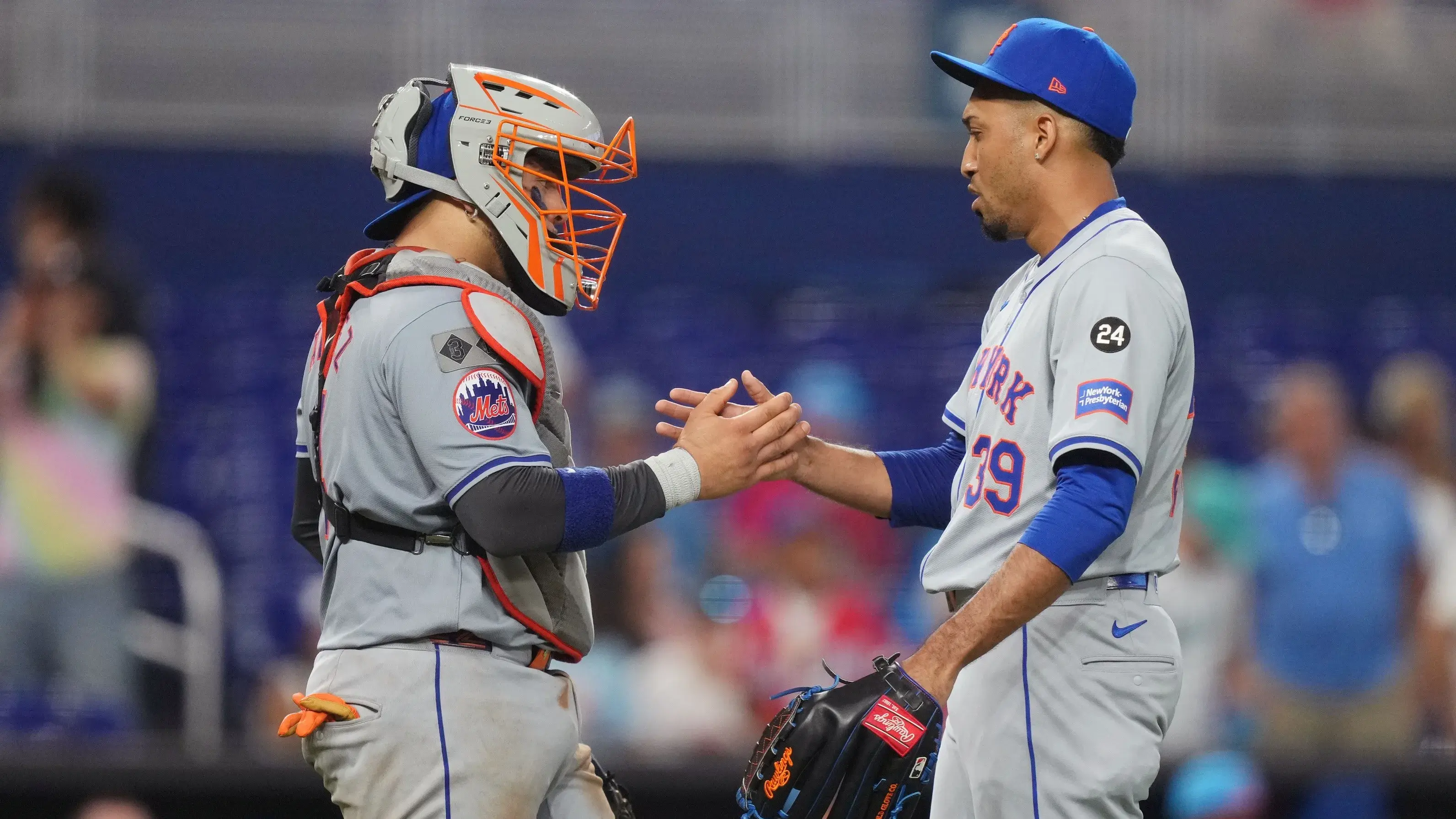 Jul 20, 2024; Miami, Florida, USA; New York Mets catcher Francisco Alvarez (4) congratulates relief pitcher Edwin Díaz (39) on a victory against the Miami Marlins at loanDepot Park. / Jim Rassol-USA TODAY Sports