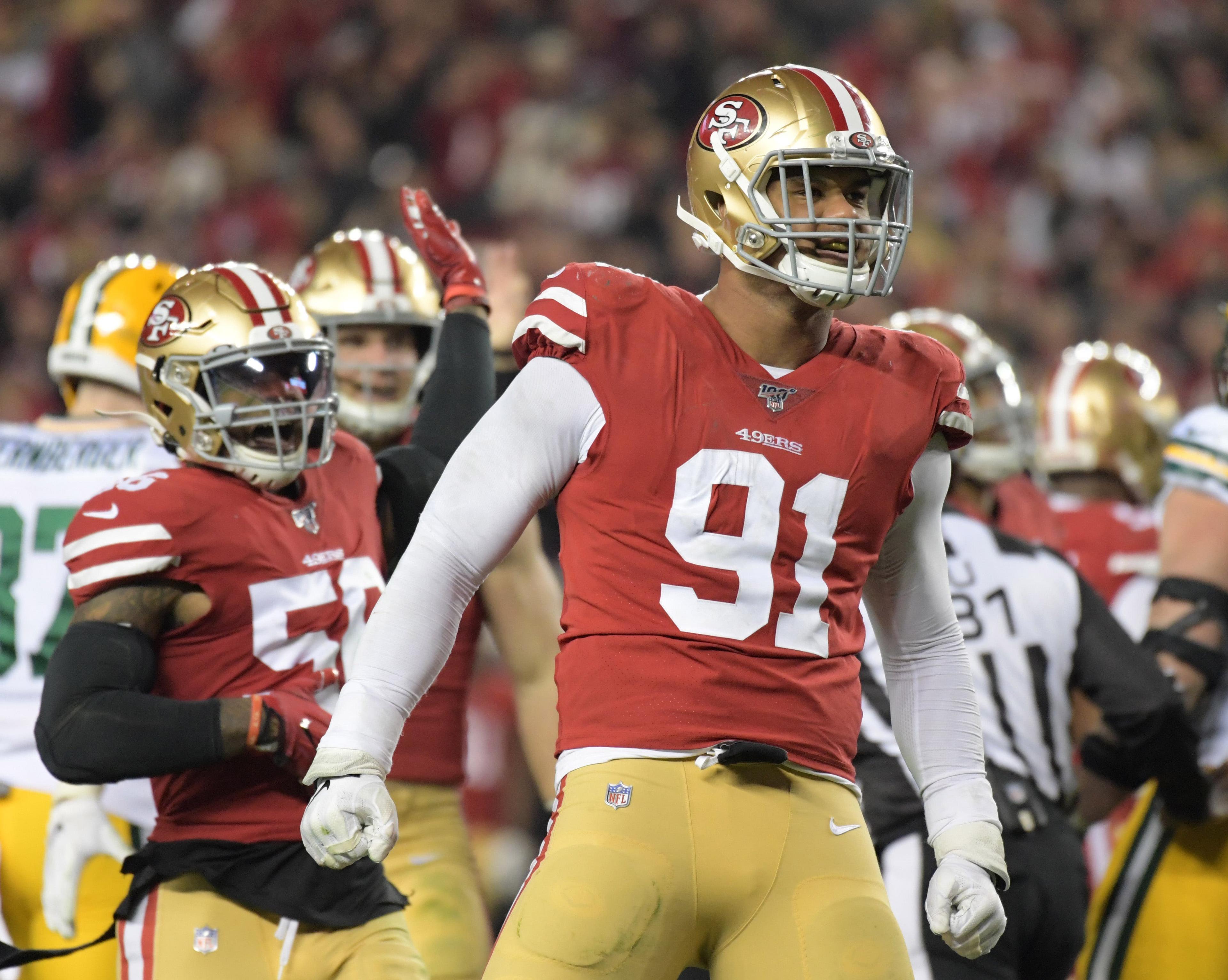 Jan 19, 2020; Santa Clara, California, USA; San Francisco 49ers defensive end Arik Armstead (91) celebrates a sack against Green Bay Packers quarterback Aaron Rodgers (not pictured) in the fourth quarter of the NFC Championship Game at Levi's Stadium. Mandatory Credit: Kirby Lee-USA TODAY Sports / Kirby Lee